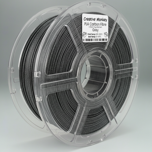 Grey filament spool with CMPLACFGrey label